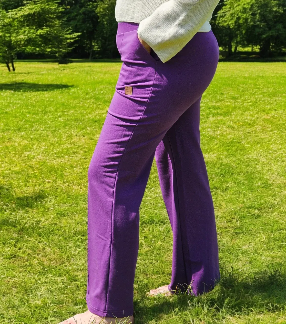 Pantaloni felpati viola da donna con piega, eleganti, in tessuto di maglia polacco