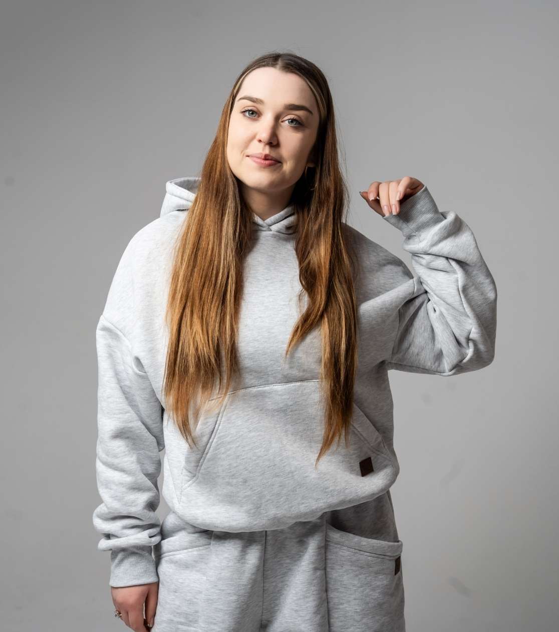 Model Wearing Gray BerryBoat Hoodie with Hood – Side View, Oversized, Gray Melange