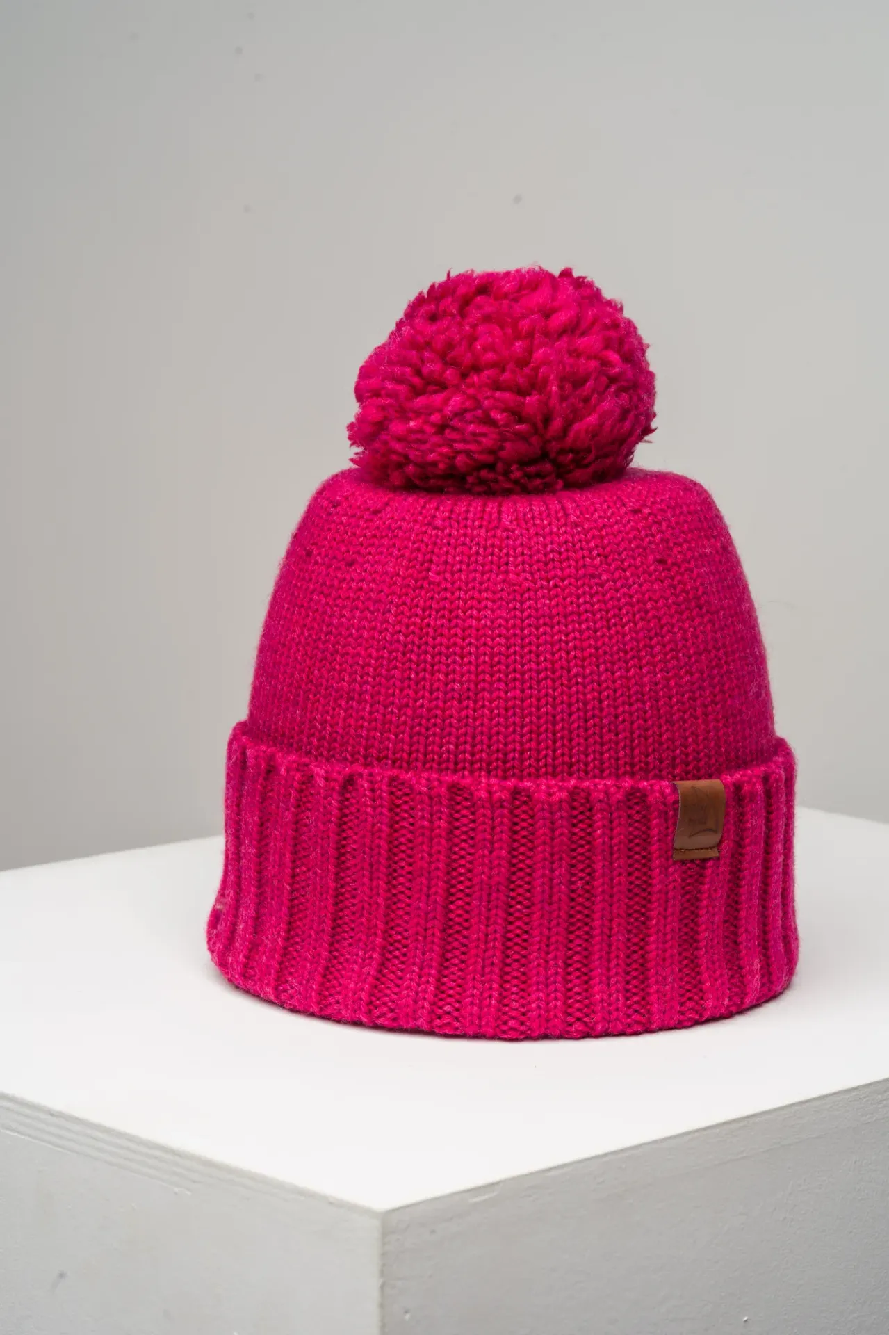 Berretto invernale spesso in lana merino con risvolto e pompon 2in1 produzione polacca